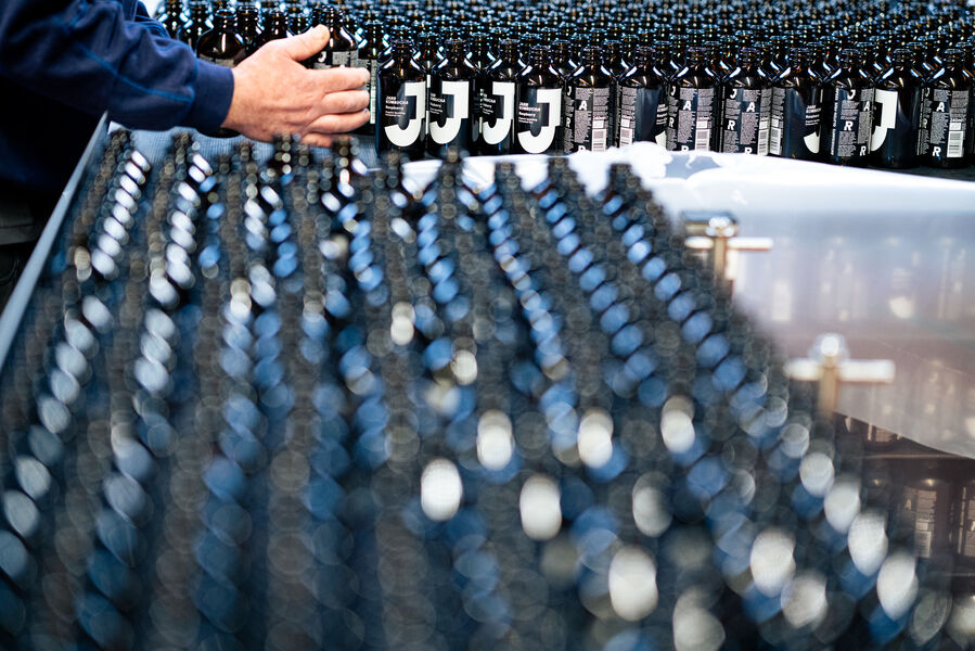 Our bottles begin their journey to get filled and capped